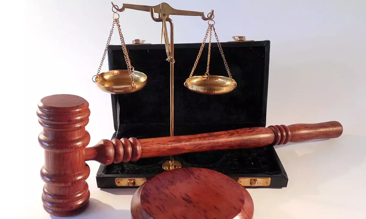 Cook docked for allegedly assaulting police officer