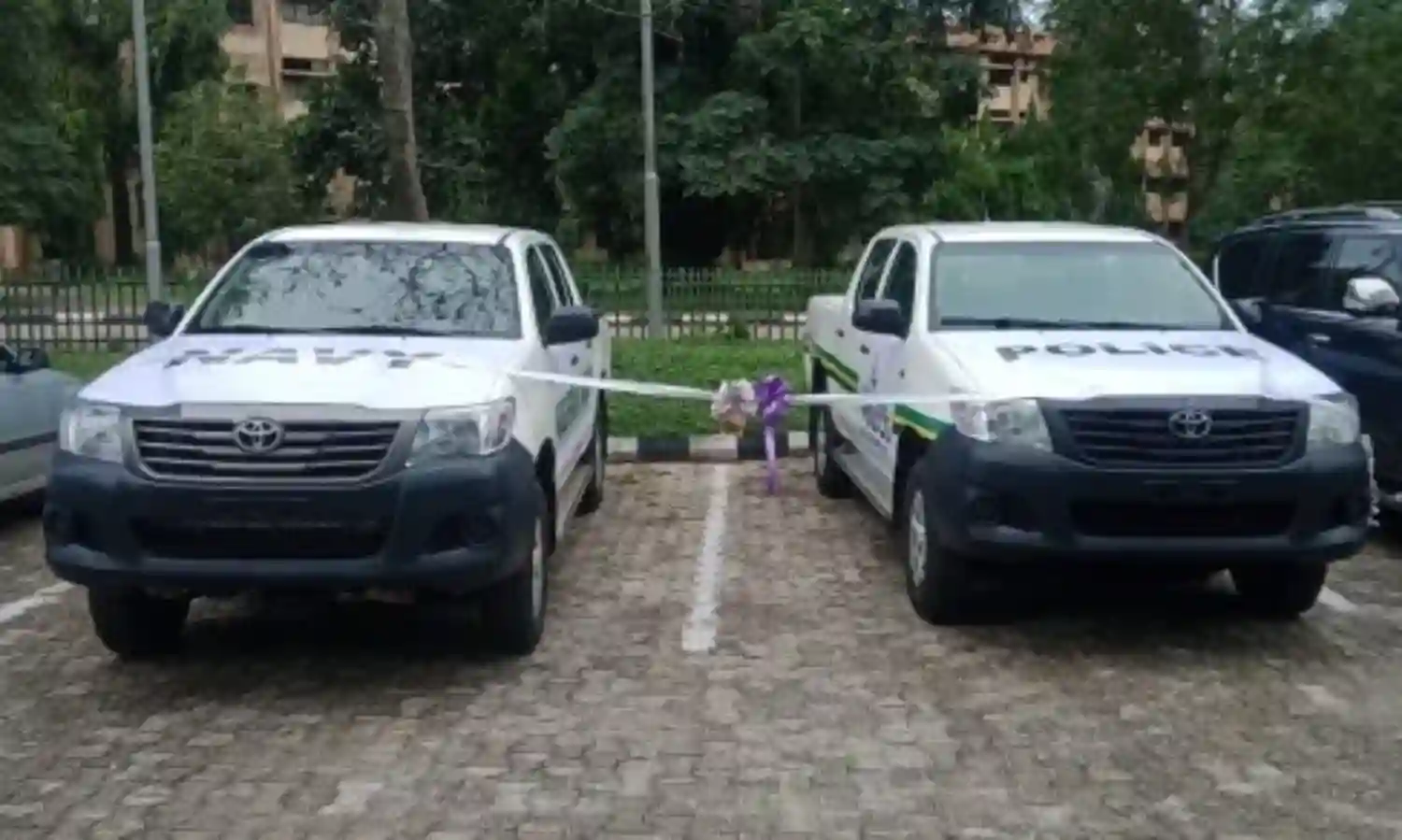 Living Faith Church donates vehicles to Navy, Police