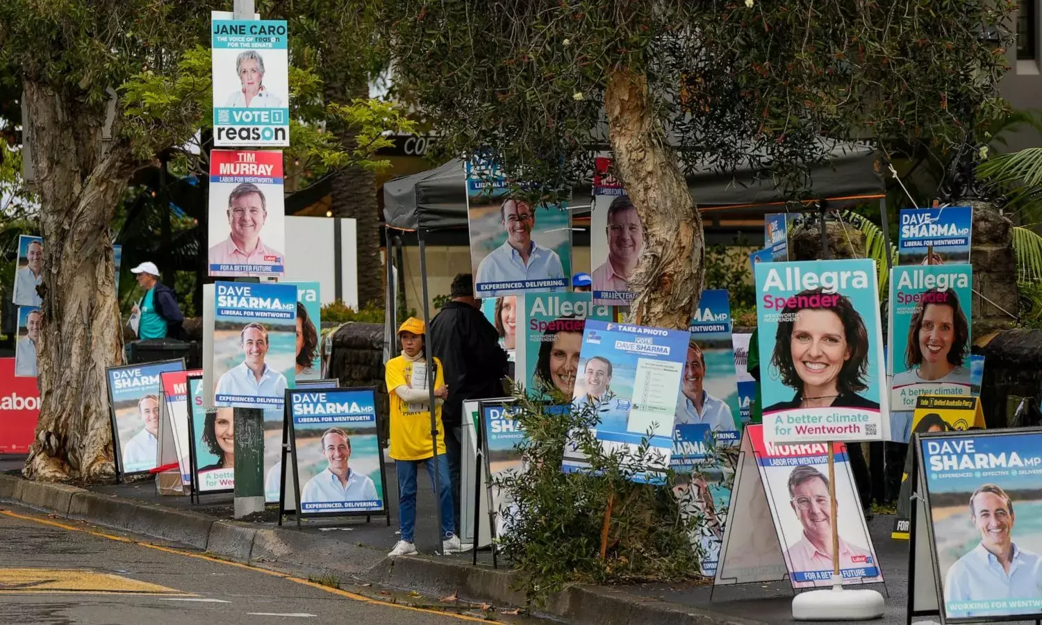 Australia election begins with opposition ahead in polls