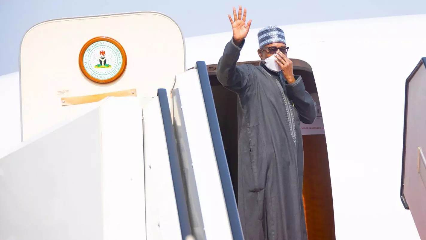 President Buhari departs Madrid for Abuja