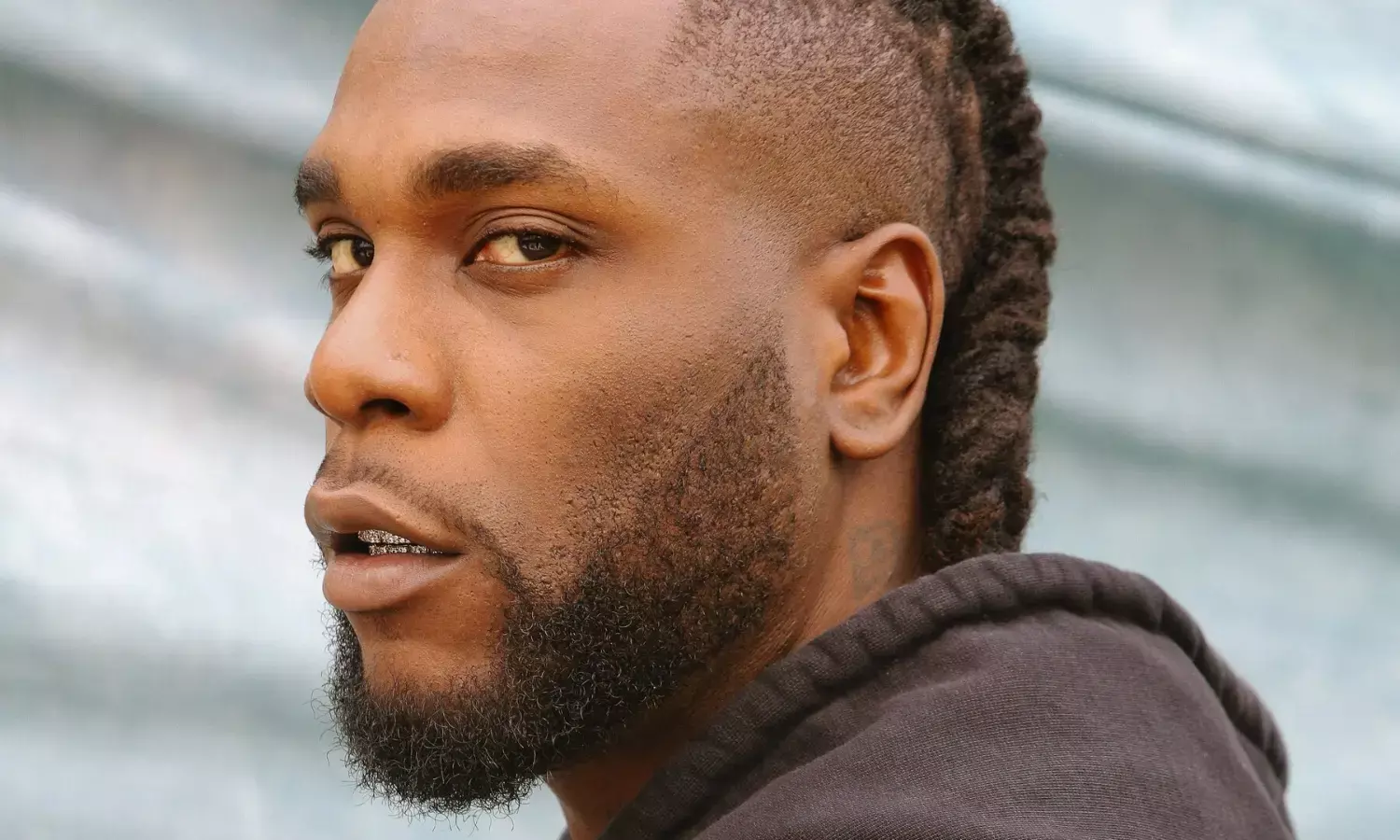 Burna Boys police escorts detained after shooting married man