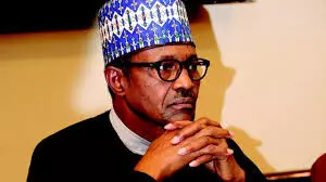 Buhari expresses mixed feelings as he swears in new CJN Ariwoola