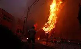 Major road closed as wildfire burns west of Athens