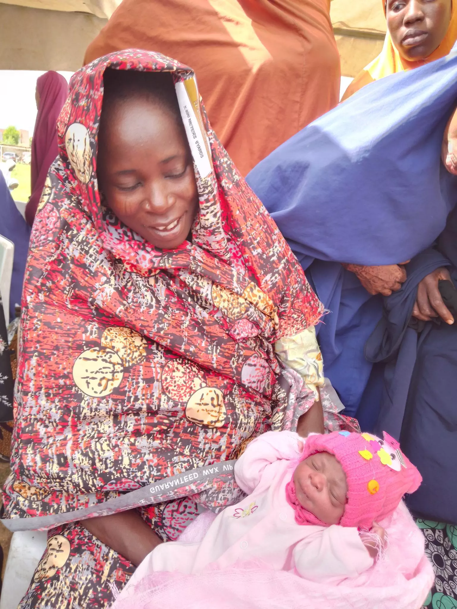 Woman delivers while waiting for kit in Kano