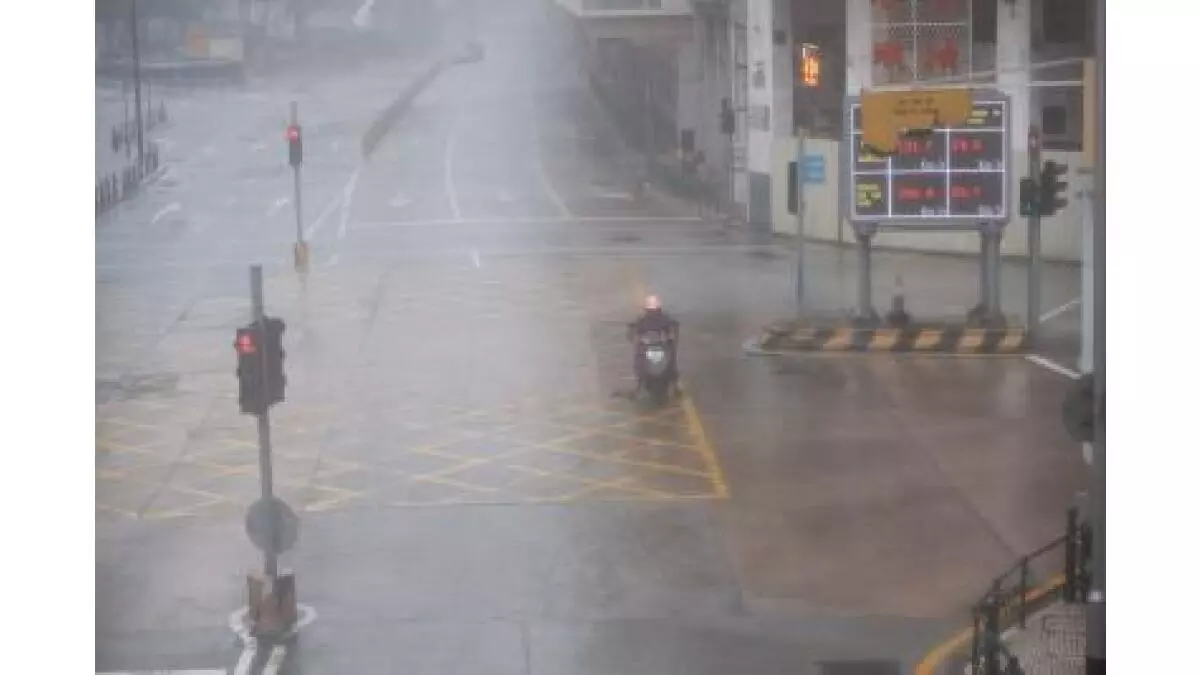 China raises alert level as heavy rain approaches