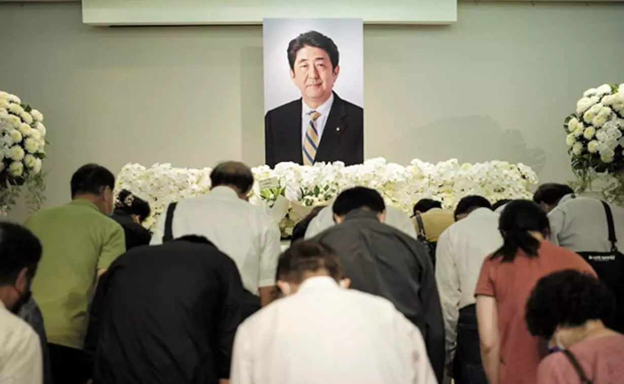 Protests at assassinated Japanese ex-prime ministers state funeral