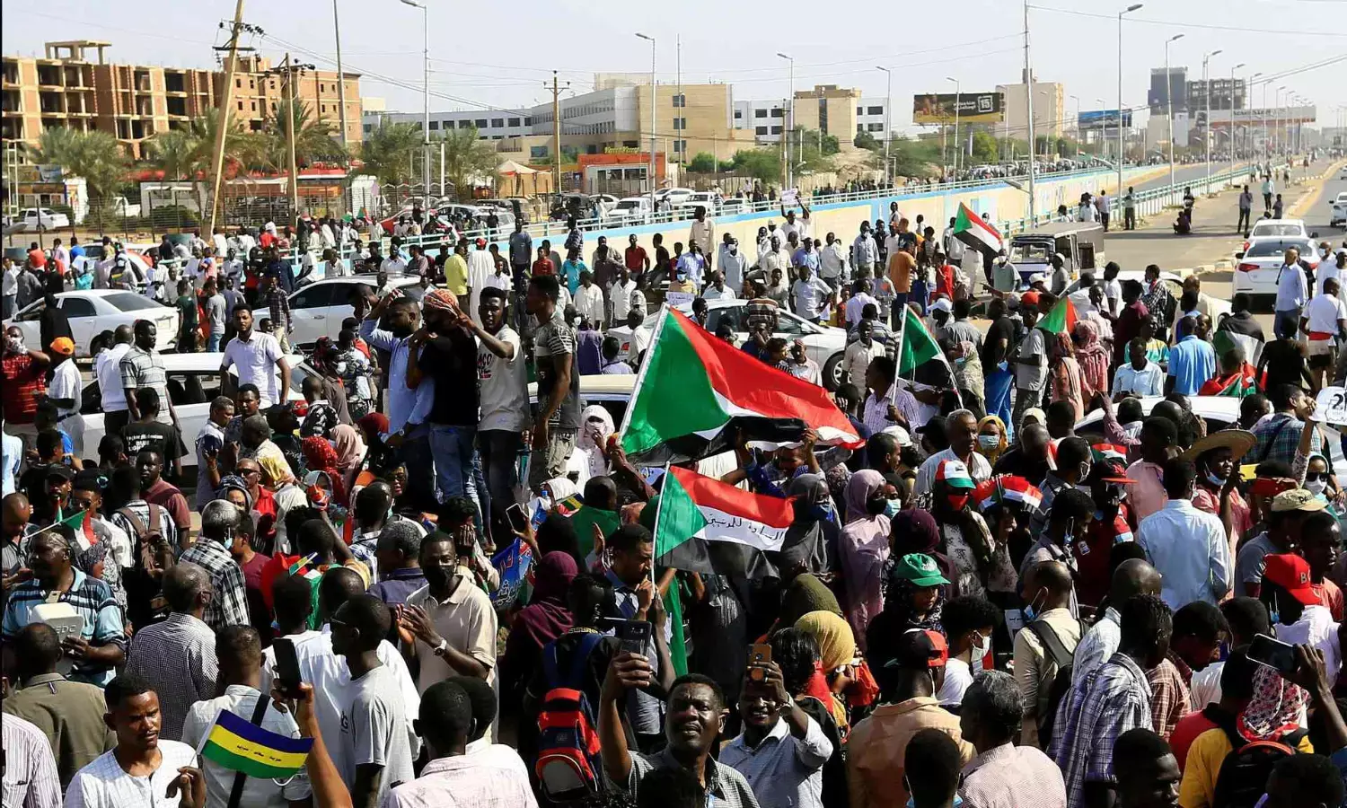 Protesters rally in Sudan on coup anniversary amid internet blockage