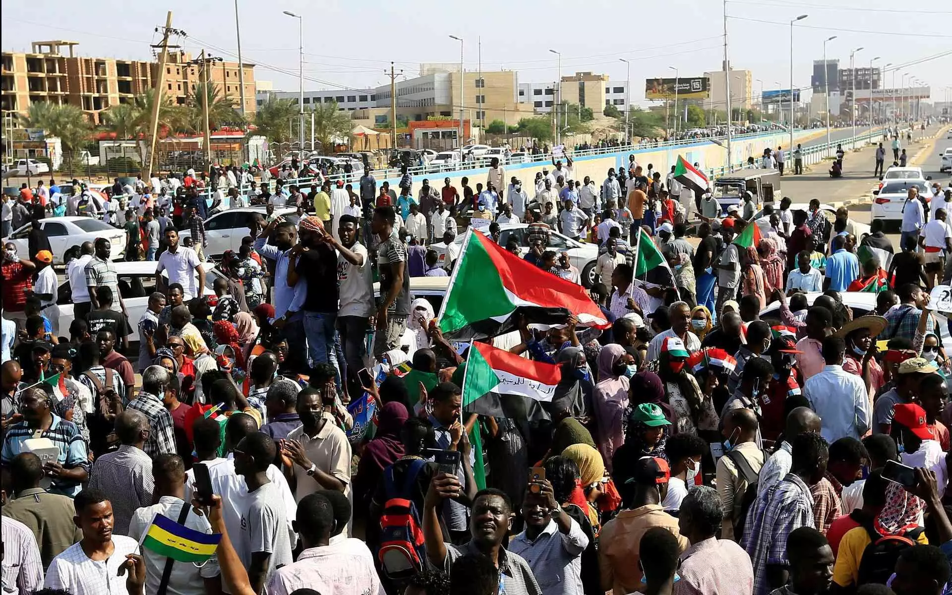 Protesters rally in Sudan on coup anniversary amid internet blockage