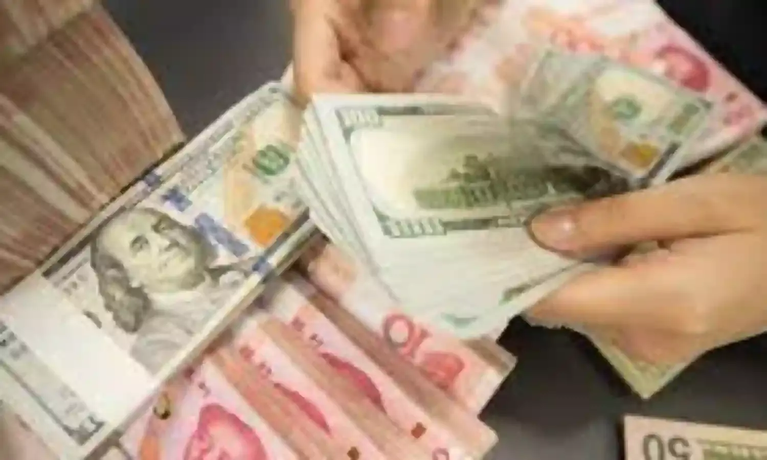 Chinese Yuan depreciates against dollar to 7.1698