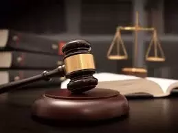 Lecturer docked for alleged sexual assault