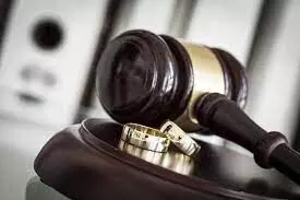 Im afraid of my wifes charms and domestic violence, man tells court