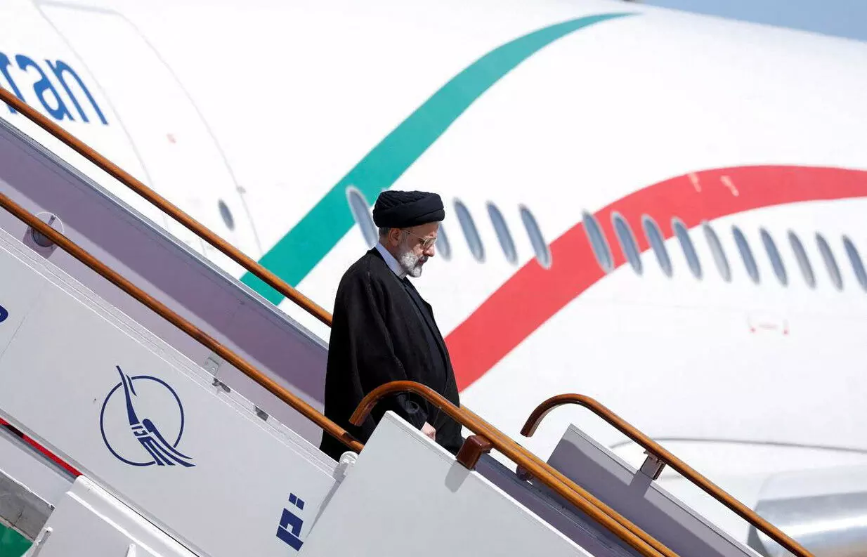Iranian president arrives in Syria for first visit since war