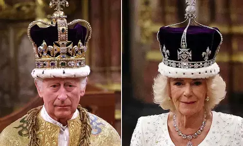 King Charles crowning draws thousands in paper crowns and plastic tiaras