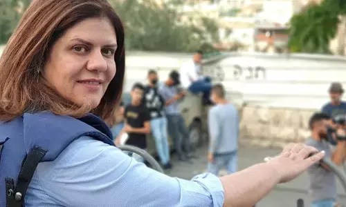 Israeli raid: Palestinians remember slain journalist