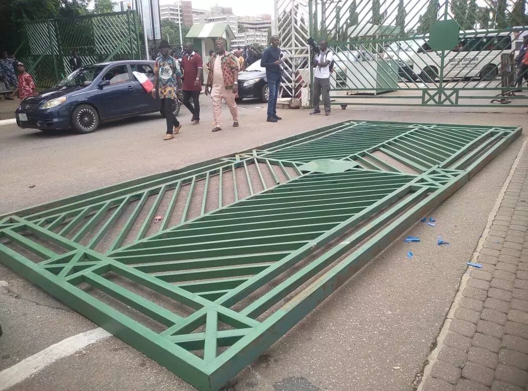 Breaking: Protesters break down National Assembly gate