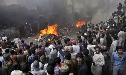 Angry mob attacks churches in Pakistan over allegations of blasphemy