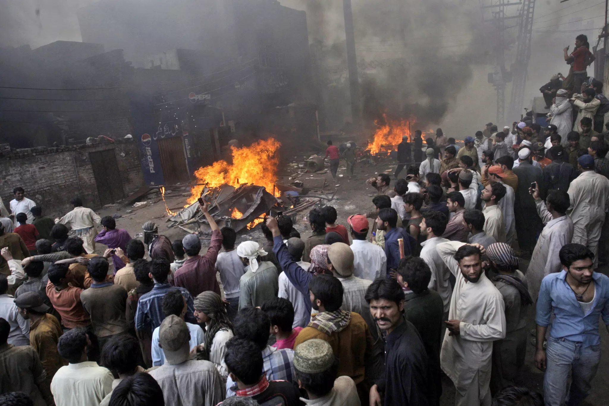 Angry mob attacks churches in Pakistan over allegations of blasphemy