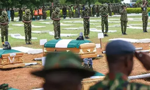 Tears flow as military personnel killed in Niger laid to rest in Abuja