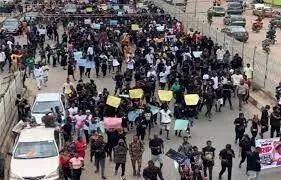 MohBad: Youths hold rally, storm late singer’s Ikorodu home