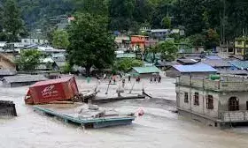 14 dead, 100 missing in flash flood