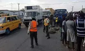 Emergency responders rescue 3 from fallen truck in Lagos
