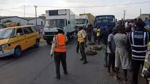 Emergency responders rescue 3 from fallen truck in Lagos