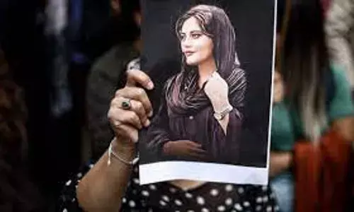 Iranian woman sentenced 2 years for photo without headscarf