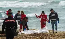 Italy brings 4 boat migrants ashore amid row over teenager’s death