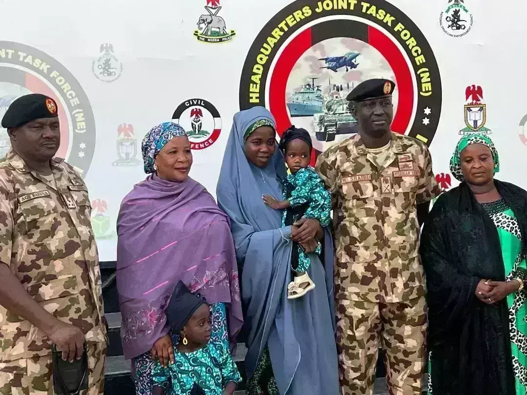 Army hands over rescued Chibok girl, 3 children to Borno govt
