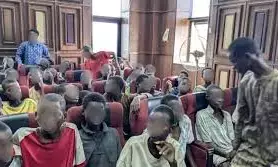 Court strikes out treason charge against minors