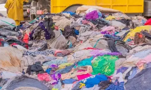 Customs bury seized second-hand clothes worth millions