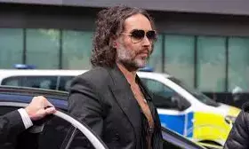 Comedian Russell Brand pleads not guilty to rape, sexual assault