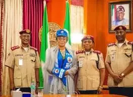 Corps Marshal decorates First Lady as Grand Matron of FRSC Special Marshals
