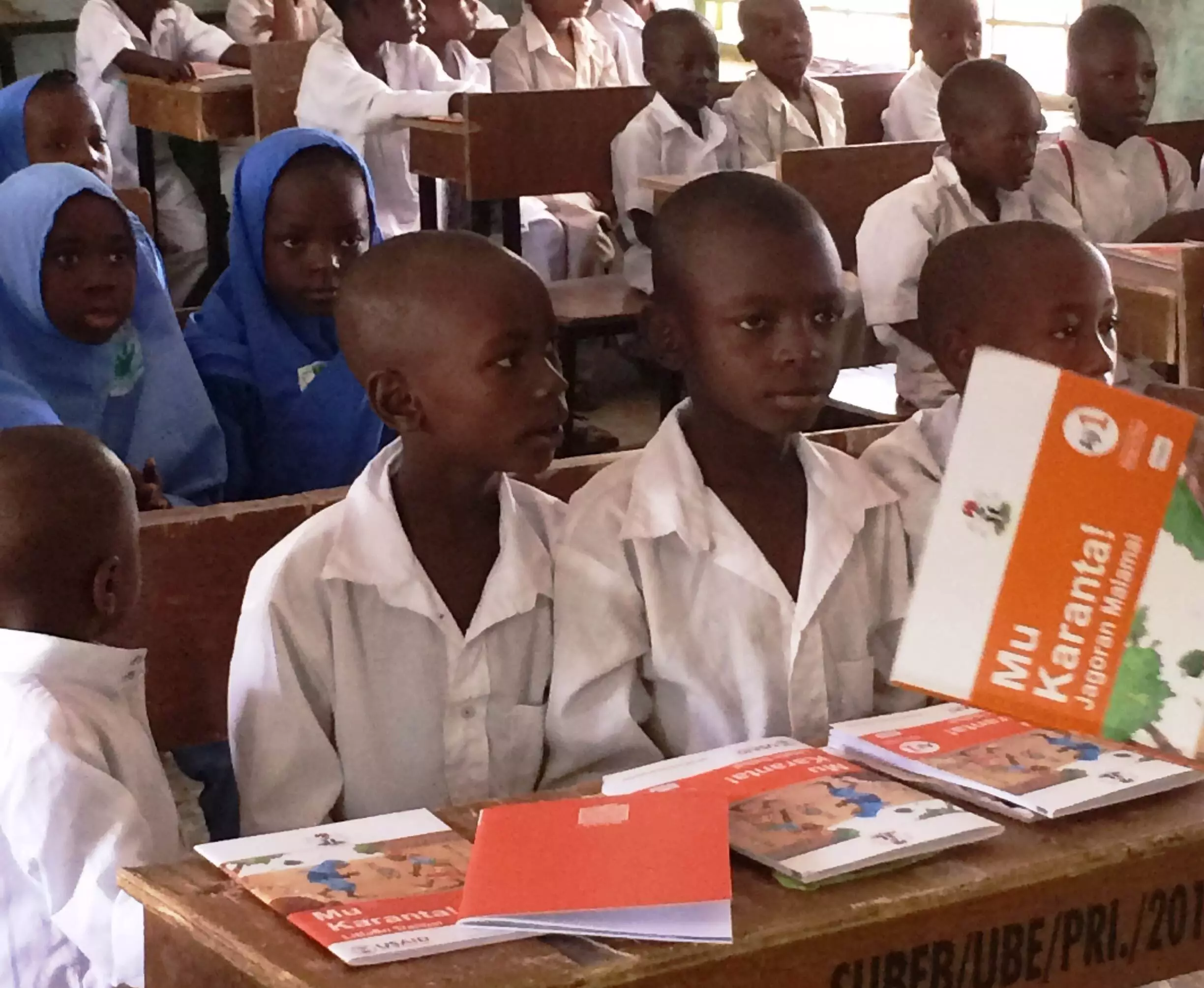 USAID Donates Textbook in Local Language to Pupils