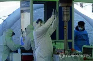 S. Korea inching closer to toughest virus curbs, as infection rate jumps