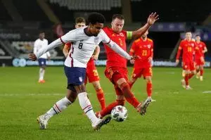 U.S. players send anti-racism messages before Wales draw