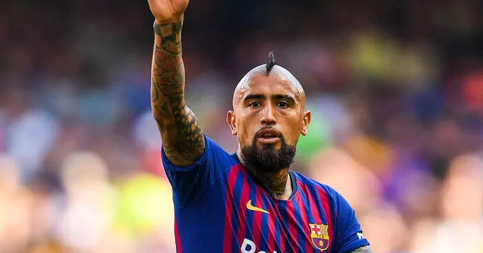 Vidal lands in Milan to complete move from Barca to Inter