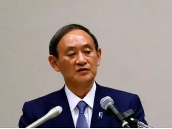 Japan’s Suga pledges focus on coronavirus but details remain sketchy