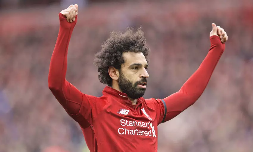 Salah double keeps Liverpool on track