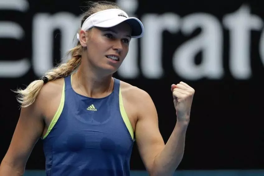 Champion Wozniacki through to second round with comfortable win