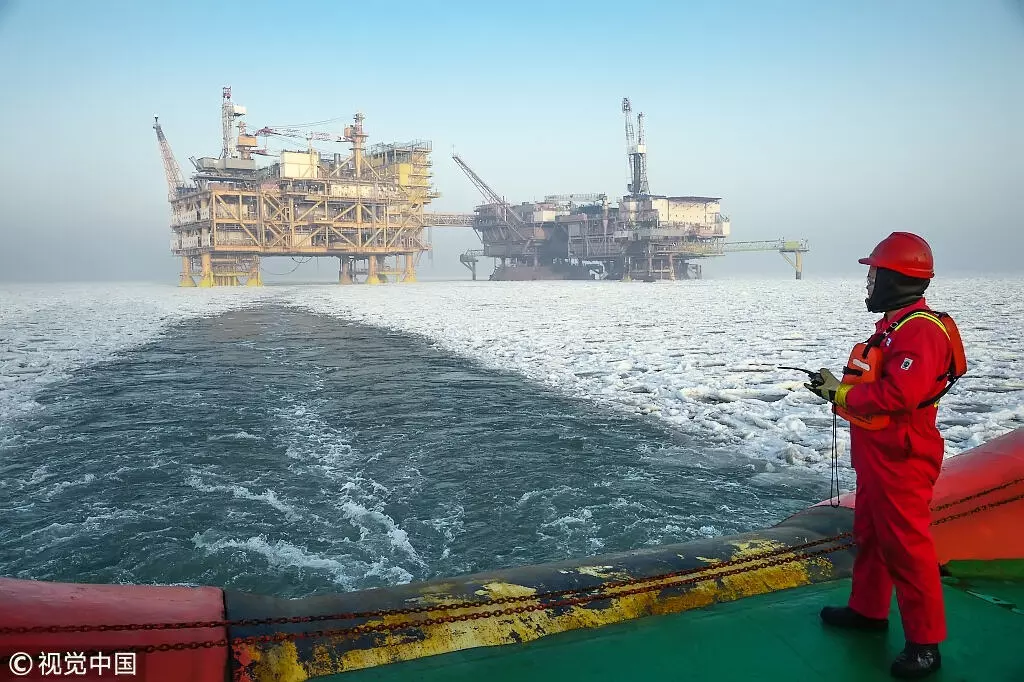 Oil prices jump on U.S-China trade hopes, supply cuts