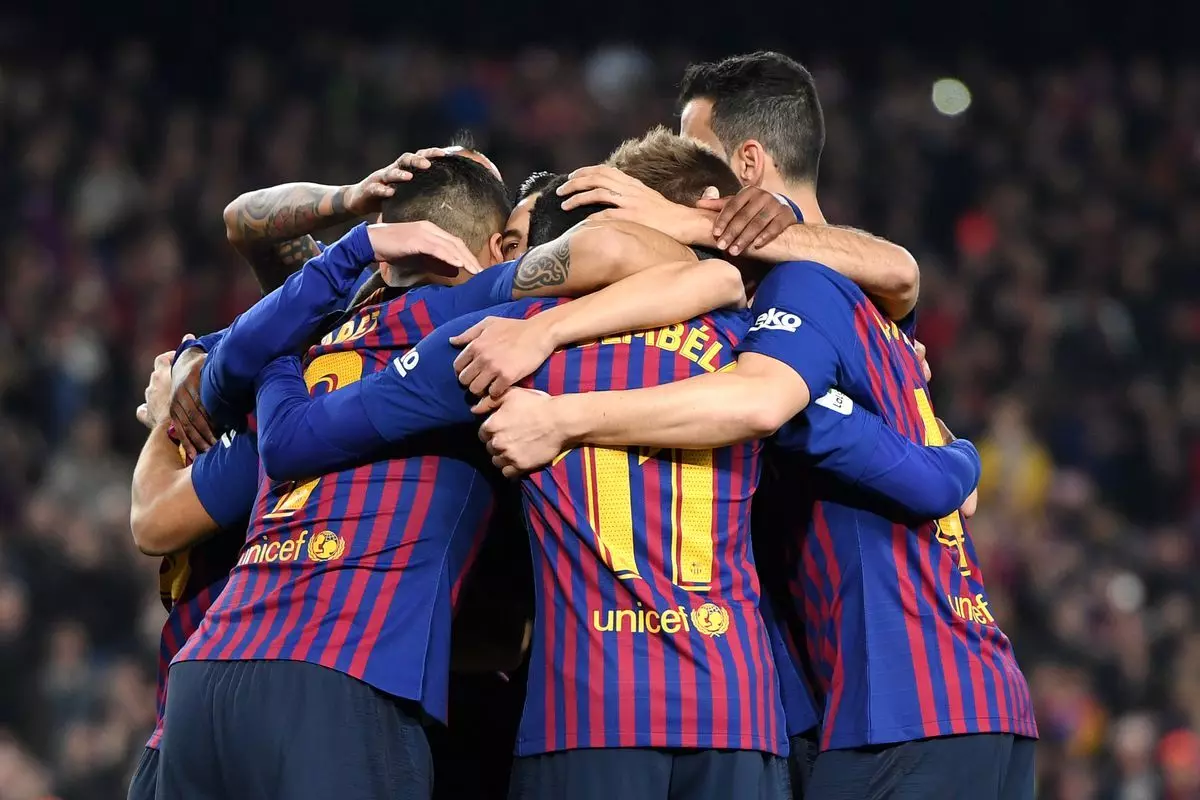 Barca ease past Celta Vigo to end year top of La Liga