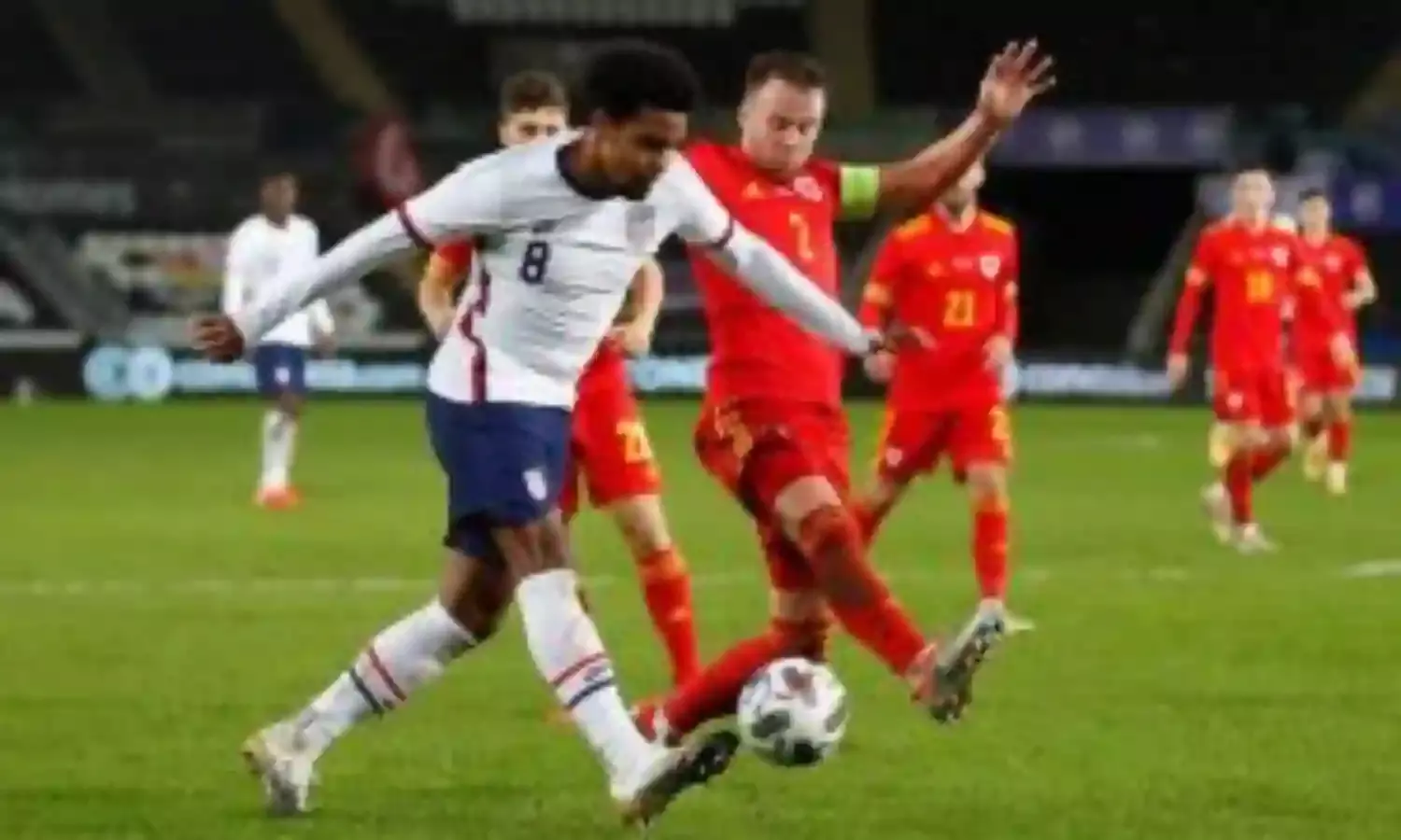 U.S. players send anti-racism messages before Wales draw