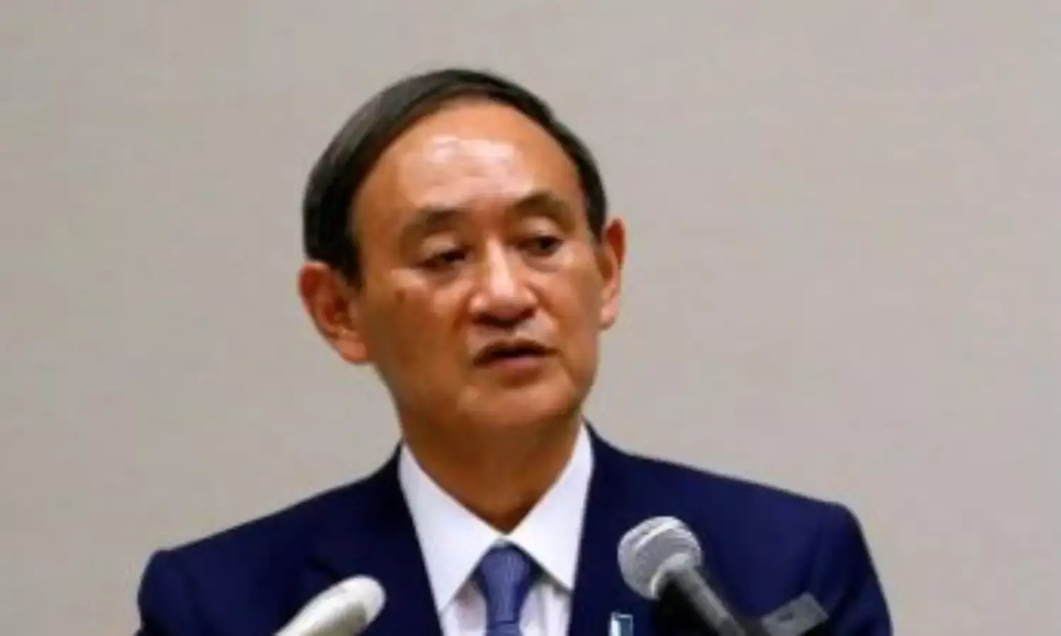Japan’s Suga pledges focus on coronavirus but details remain sketchy