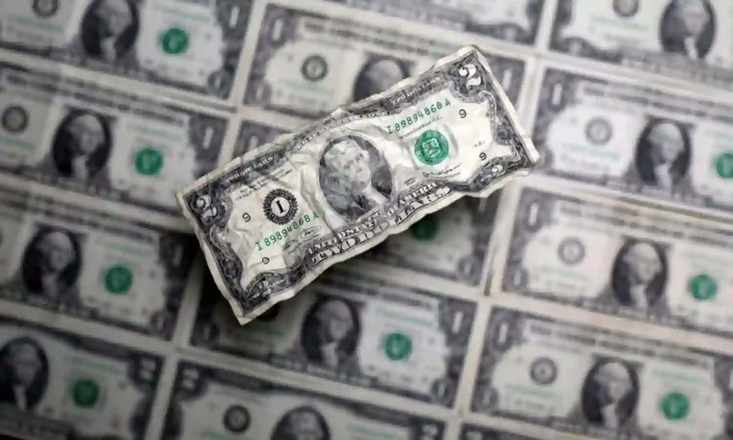 Dollar slips as trade progress boosts risk assets; kiwi soars