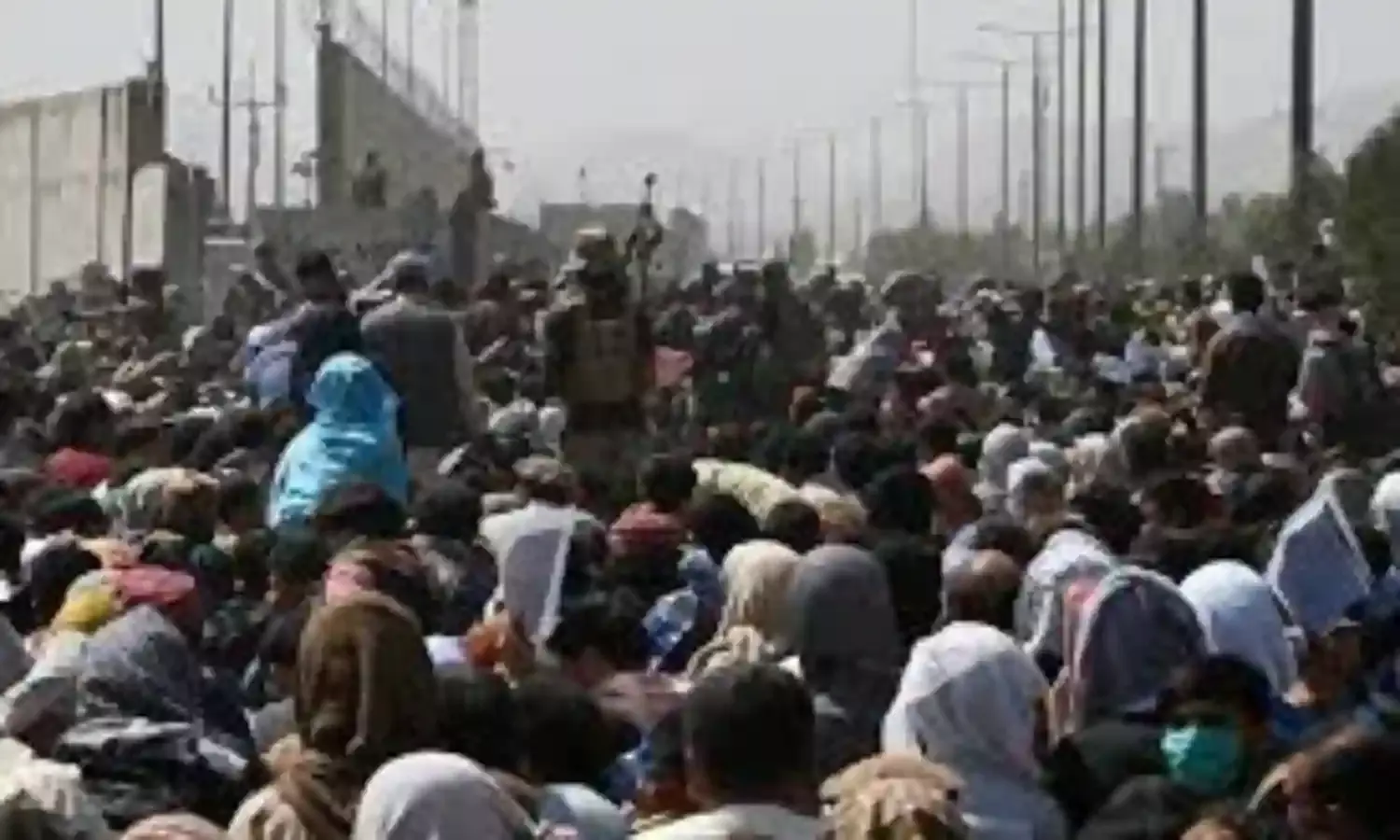 Crowds continue to gather at Kabul airport