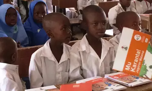 USAID Donates Textbook in Local Language to Pupils USAID Donates Textbook in Local Language to Pupils
