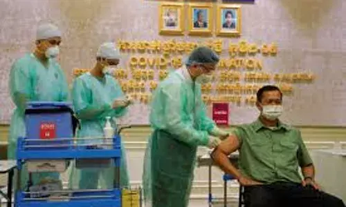 Prime Ministers Son Gets Vaccine Shot First in Cambodia