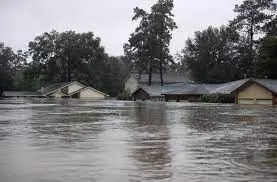 Flood destroys 4 houses, church