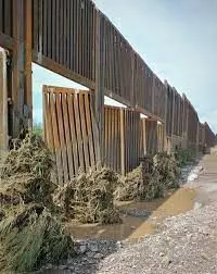Trump border wall damaged by heavy flooding